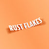 Rust Flakes' White Vinyl Sticker